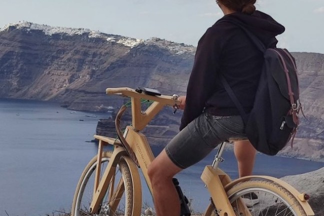 a person sitting on a bicycle